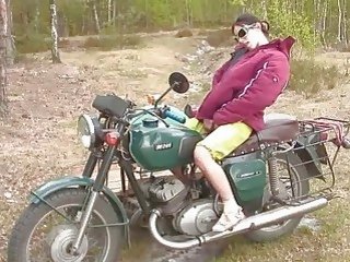 Concupiscent russian brunette teen masturbates on a motor bike
