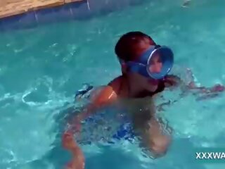 Tremendous brunette slut Candy swims underwater