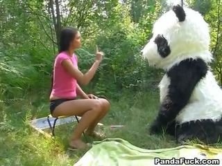 X rated movie in the woods with a huge toy panda