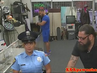 Petite cop plowed in pawnshop for cash