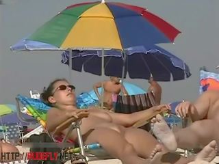 A graceful chick in a nude beach spy cam mov