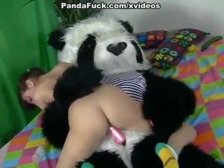 Fascinating brunette schoolgirl seducing Panda bear